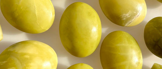 Lemon Jade polished stones displaying their vibrant yellow colour — Auralis Crystals