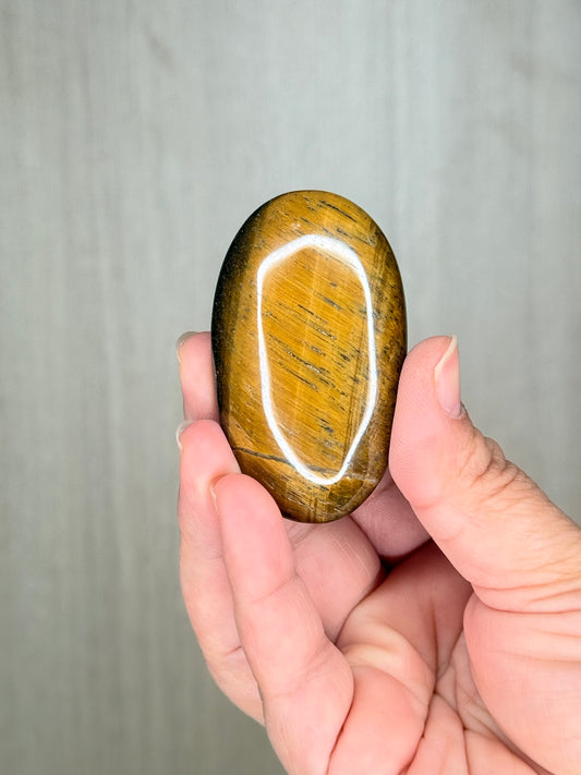 Golden Tiger’s Eye Palmstone – Mystical Crystal for Focus & Protection
