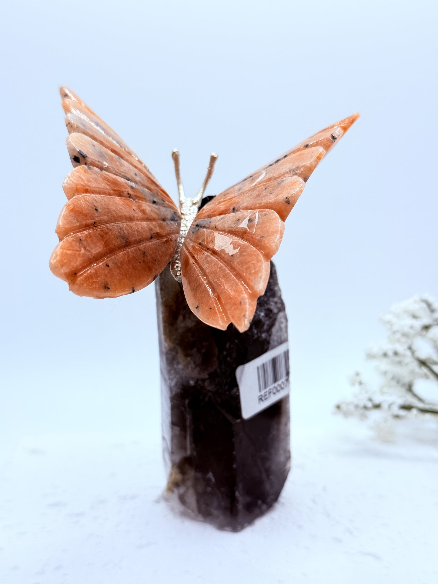 Sunstone Butterfly on Smoky Quartz Point